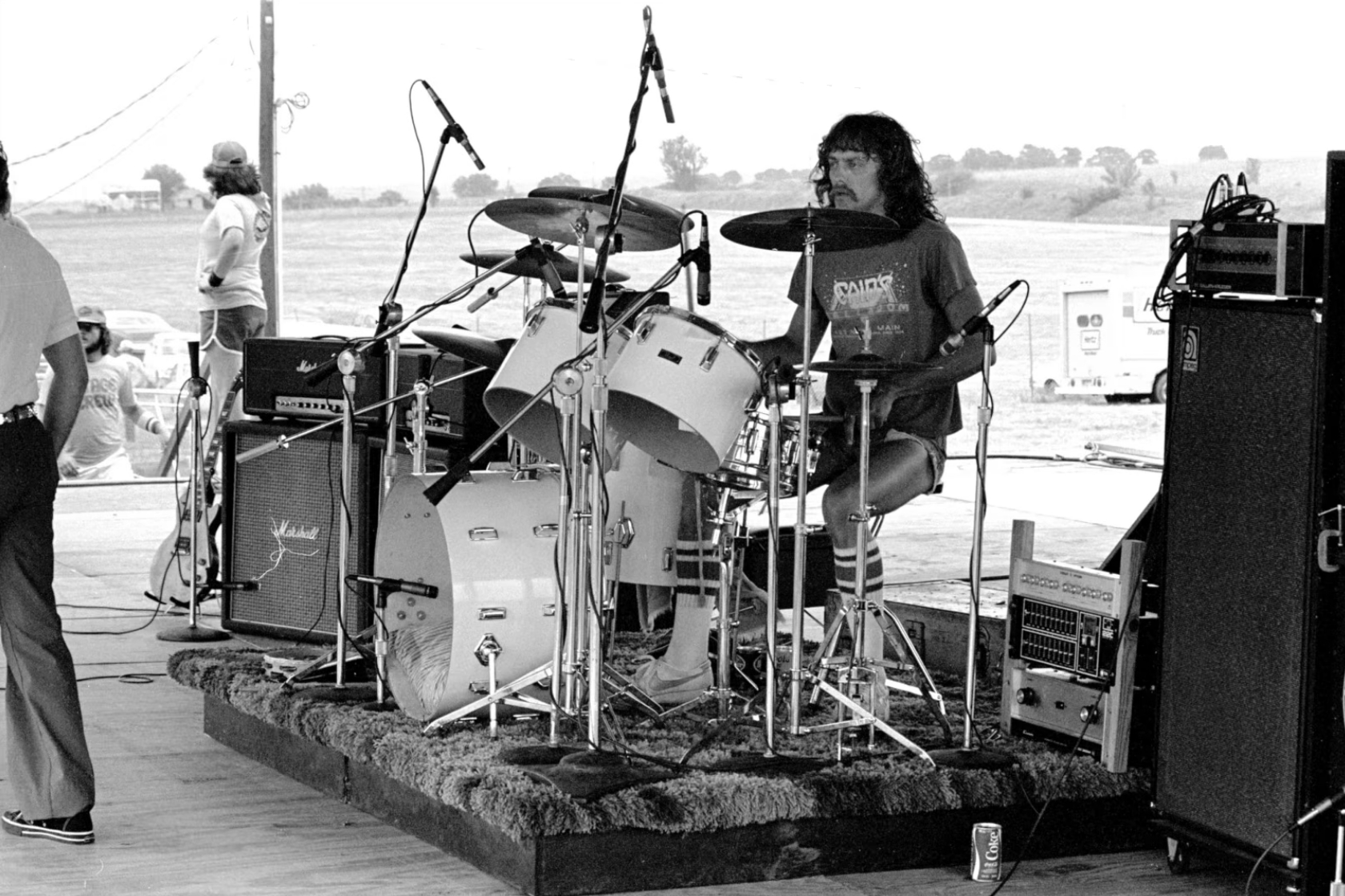 David Blue performing on drums during a live set