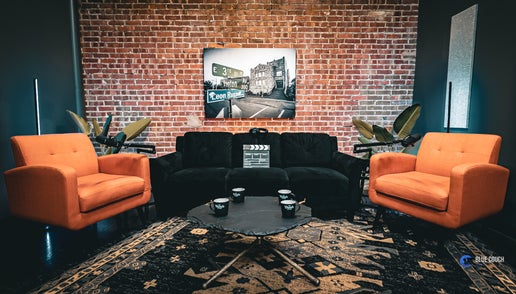 Brick room podcast studio rental at Blue Couch Studio in Tulsa