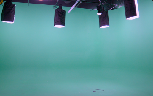 Green cyclorama studio for podcast and video production at Blue Couch Studio